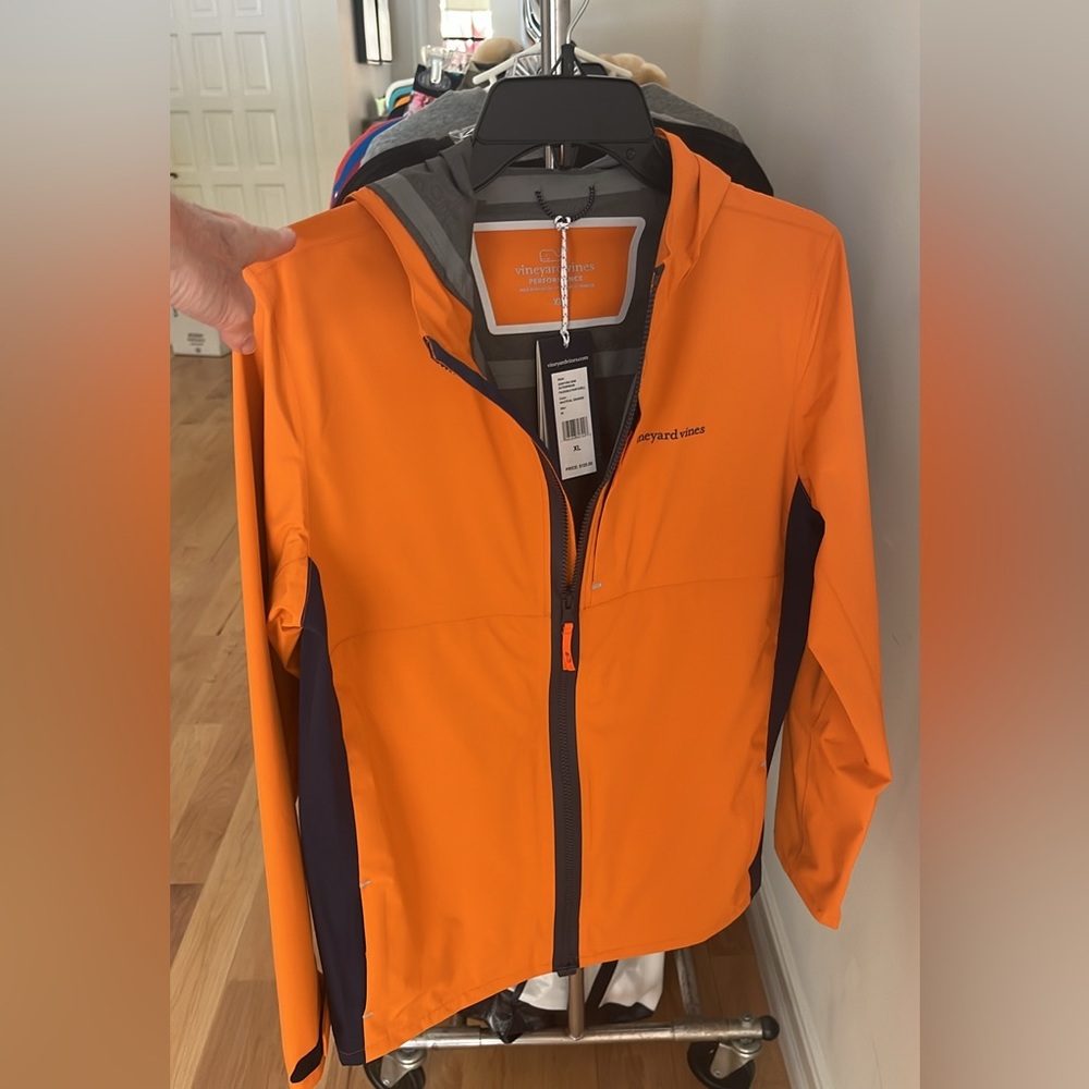 Brand new with tags never warn Boys' On-The-Go Packable Rain Shell.  Size XL